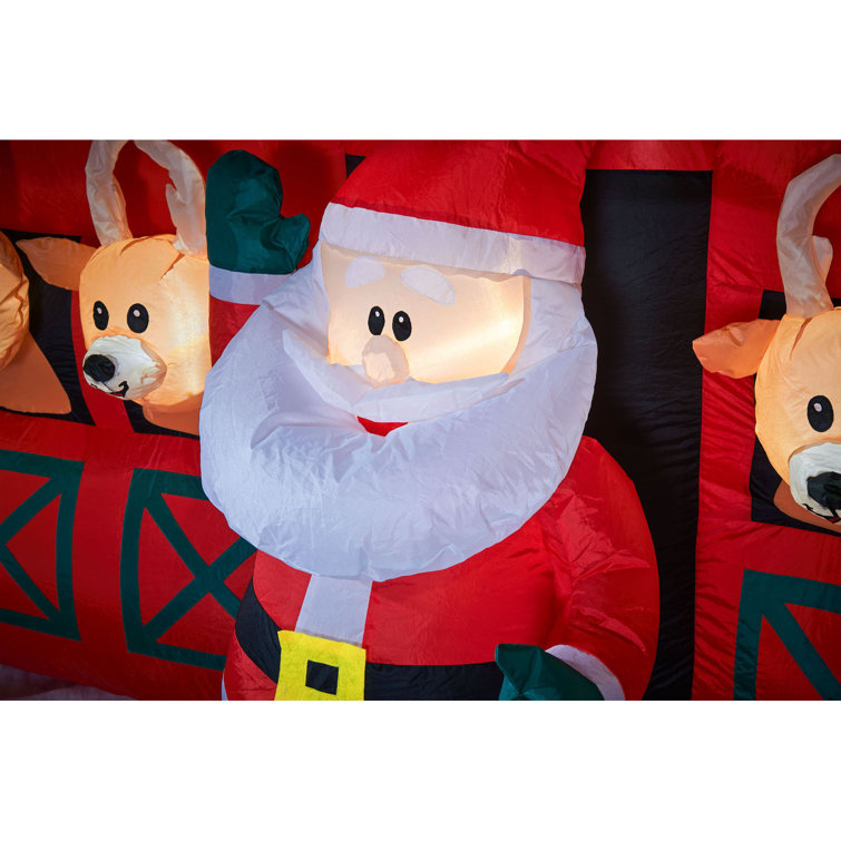 The Seasonal Aisle Santa and Reindeer Stables Inflatable Wayfair.co.uk
